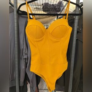 NWOT Yellow Bodysuit